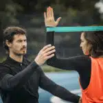 Young Woman Exercising with Resistance Band